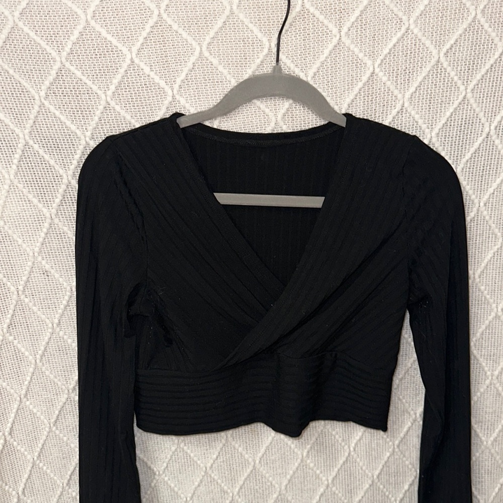Black crossover going out top. Great condition! $7 OBO